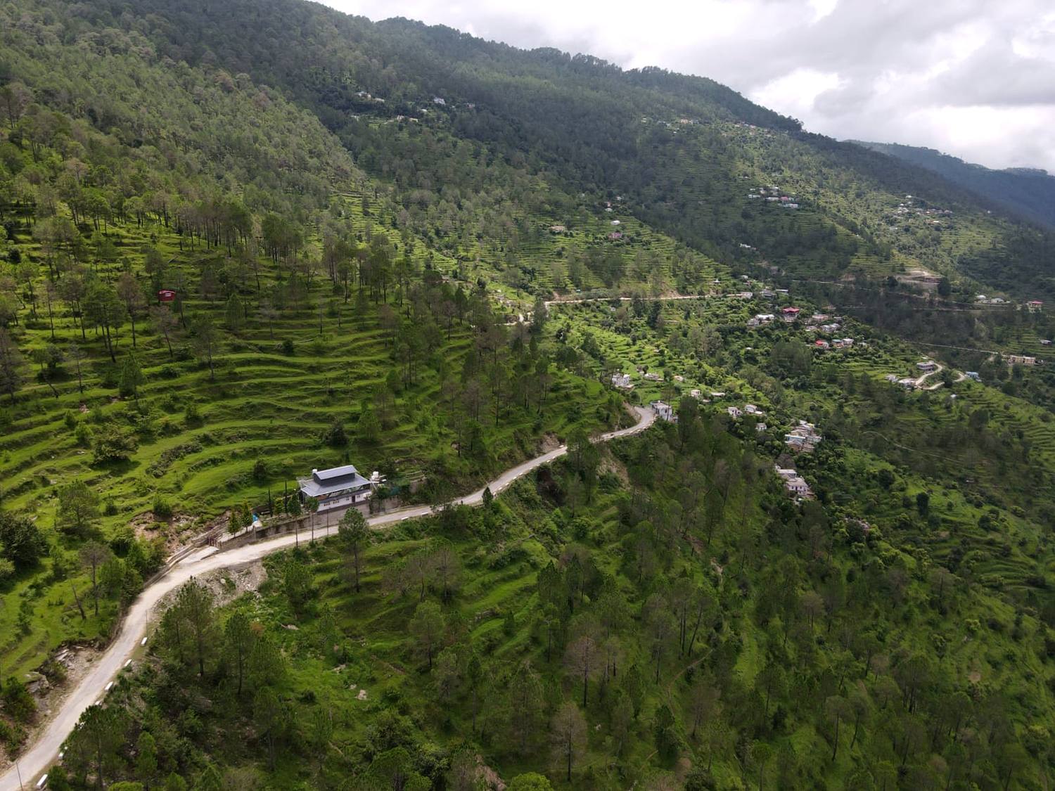 Aerial view of the valley, road and neighbouring Kumaoni settlement